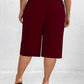 Pantalones elegantes de talla grande, color liso, cintura elástica, corte ajustado, 7/8, bolsillos inclinados, cómodos y elásticos para mujer.