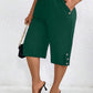 Pantalones elegantes de talla grande, color liso, cintura elástica, corte ajustado, 7/8, bolsillos inclinados, cómodos y elásticos para mujer.