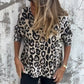 Top elástico de mujer con cuello redondo y estampado de leopardo