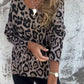 Top elástico de mujer con cuello redondo y estampado de leopardo