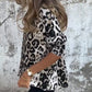 Top elástico de mujer con cuello redondo y estampado de leopardo