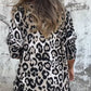 Top elástico de mujer con cuello redondo y estampado de leopardo