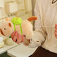 Peluche de carpincho que hace girar la col
