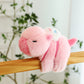 Peluche de carpincho que hace girar la col