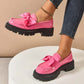 Mocasines elegantes de plataforma con laz