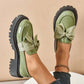 Mocasines elegantes de plataforma con laz