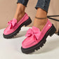 Mocasines elegantes de plataforma con laz