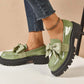 Mocasines elegantes de plataforma con laz