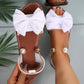 Elegantes sandalias con tira al tobillo y perlas.
