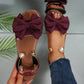 Elegantes sandalias con tira al tobillo y perlas.