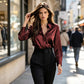 Camisa elegante de mujer con solapa y botones.