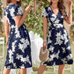 Vestido vaporoso de mujer con escote en V y cintura ajustada, estampado floral.