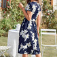 Vestido vaporoso de mujer con escote en V y cintura ajustada, estampado floral.