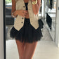Minifalda elegante con pliegues y ribete de encaj