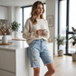 Pantalones cortos vaqueros rasgados de talle alto para mujer