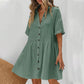 Vestido midi de manga corta con cuello de camisa y botone